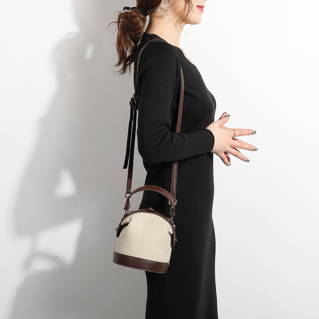 Retro snap-fastening cylindrical PU leather bucket bag