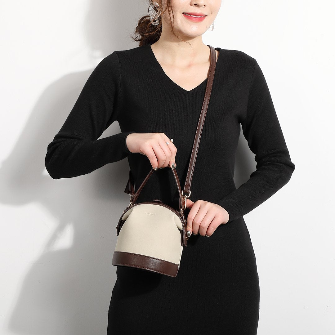 Retro snap-fastening cylindrical PU leather bucket bag