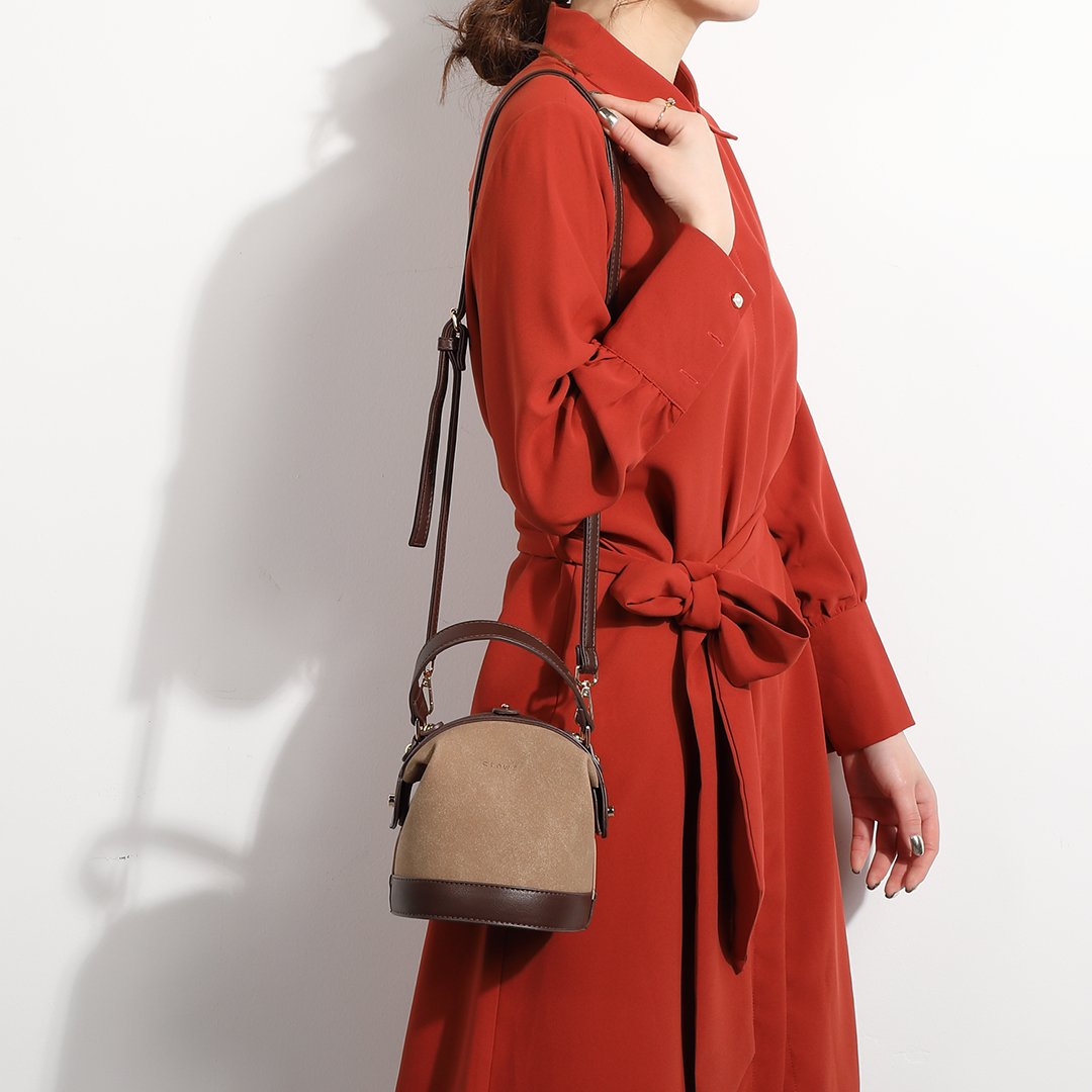 Retro snap-fastening cylindrical PU leather bucket bag