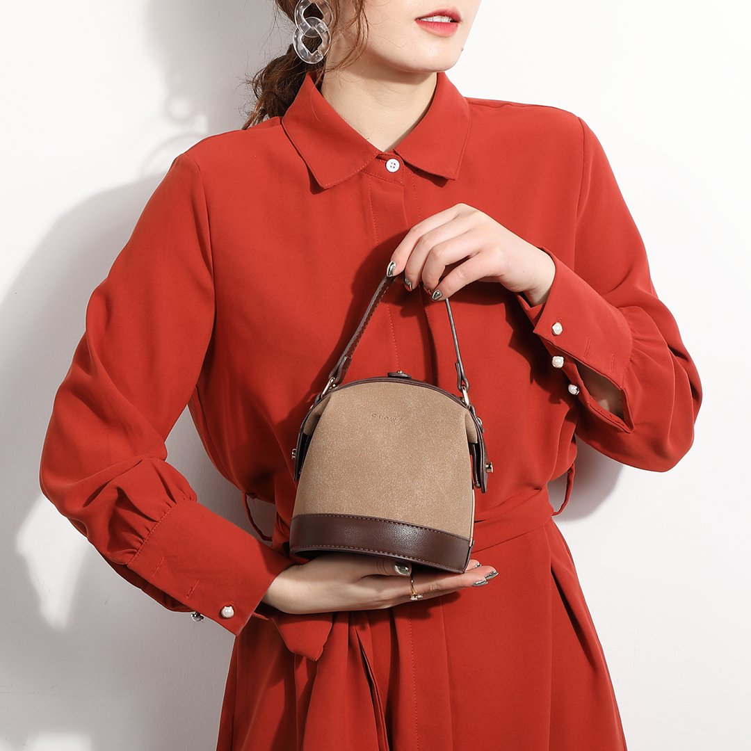 Retro snap-fastening cylindrical PU leather bucket bag