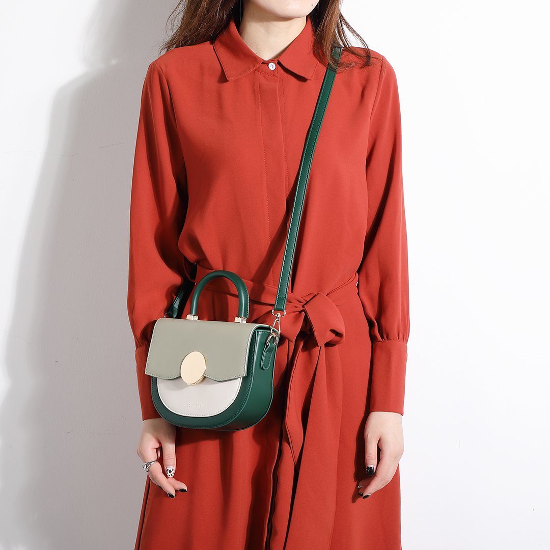 Circular hardware flap colourblock PU leather crossbody bag