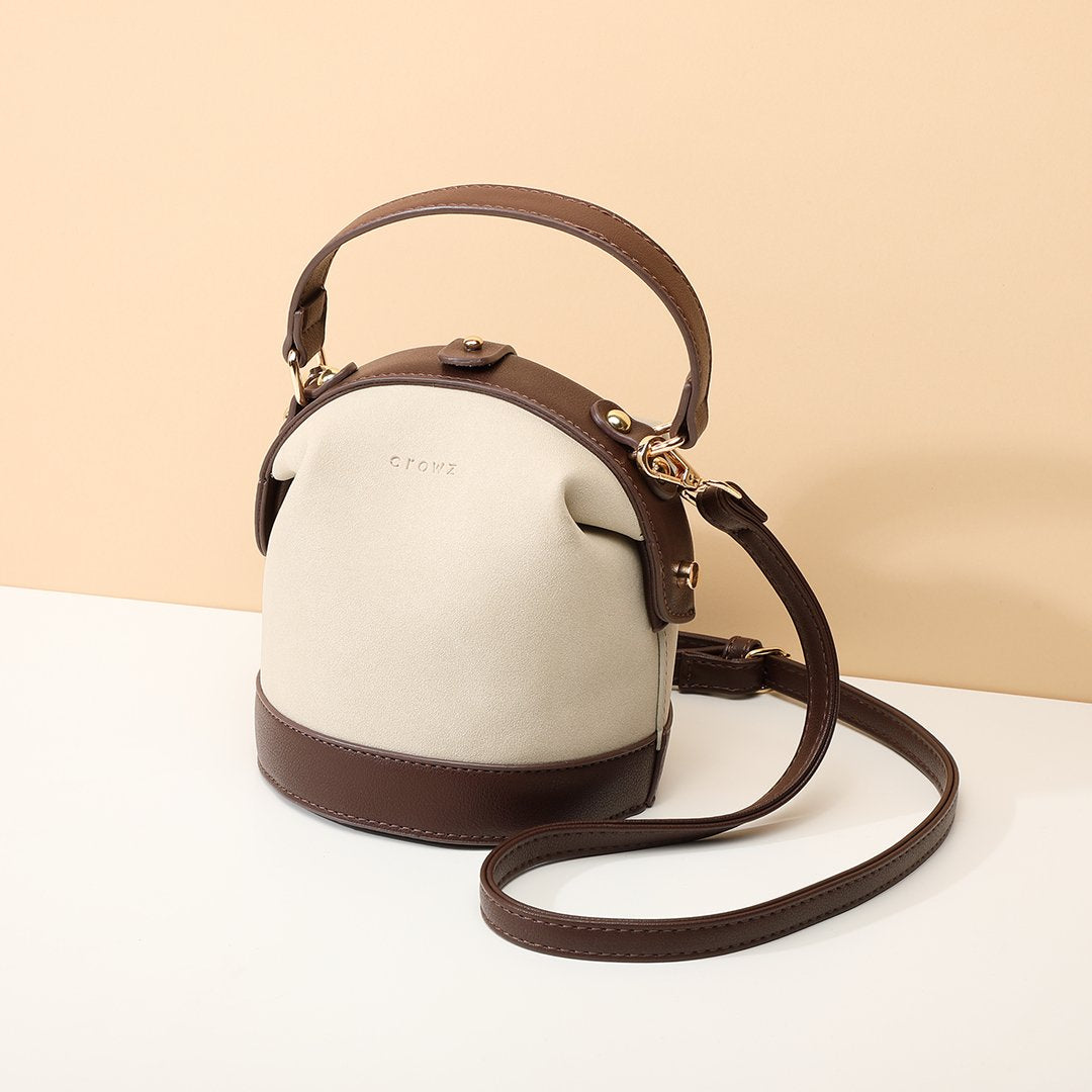 Retro snap-fastening cylindrical PU leather bucket bag