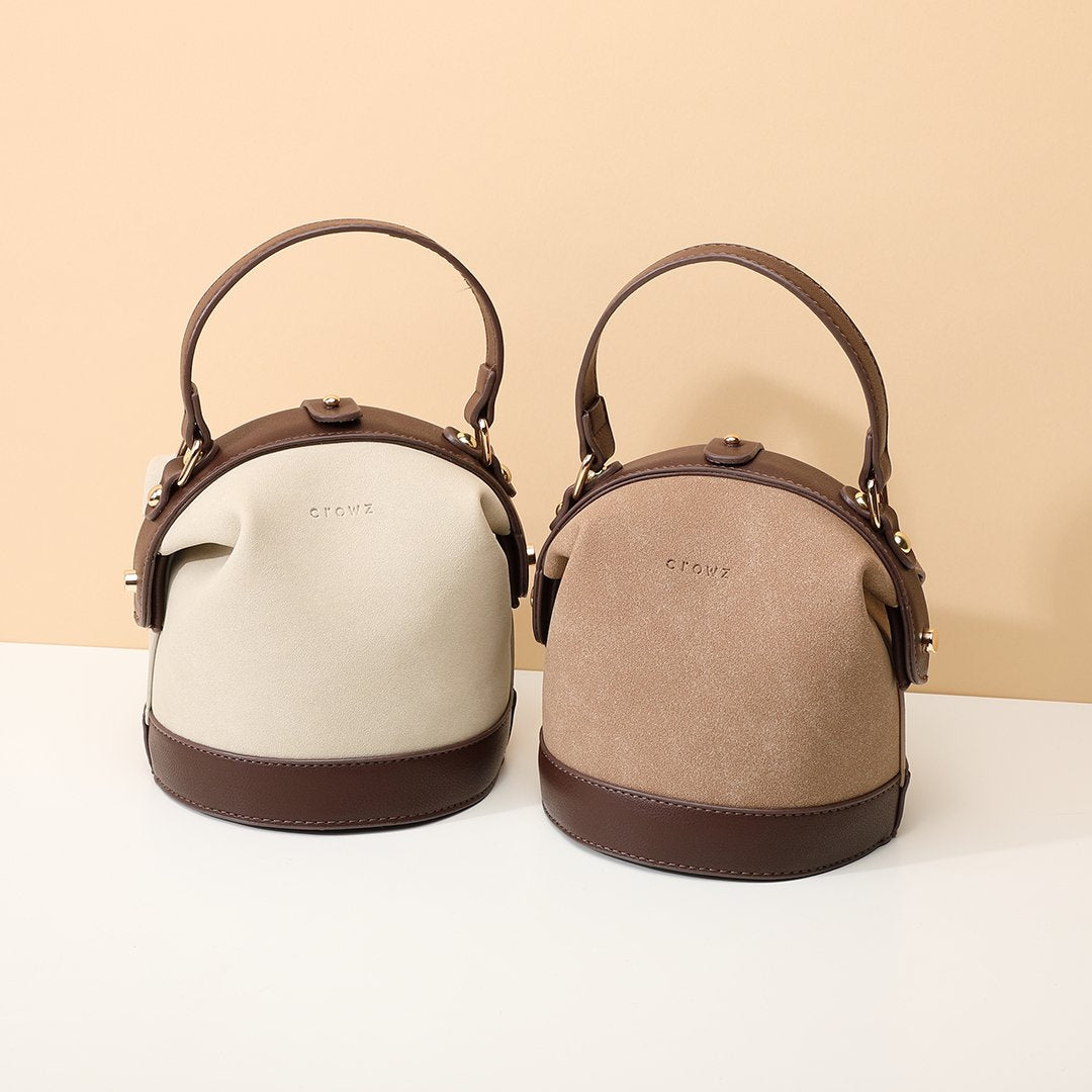 Retro snap-fastening cylindrical PU leather bucket bag