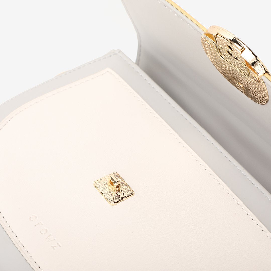 Circular hardware flap colourblock PU leather crossbody bag