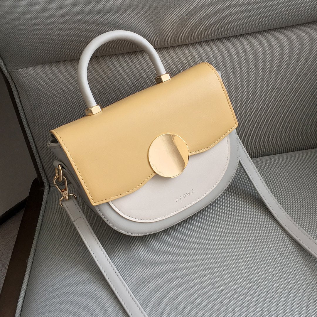 Circular hardware flap colourblock PU leather crossbody bag