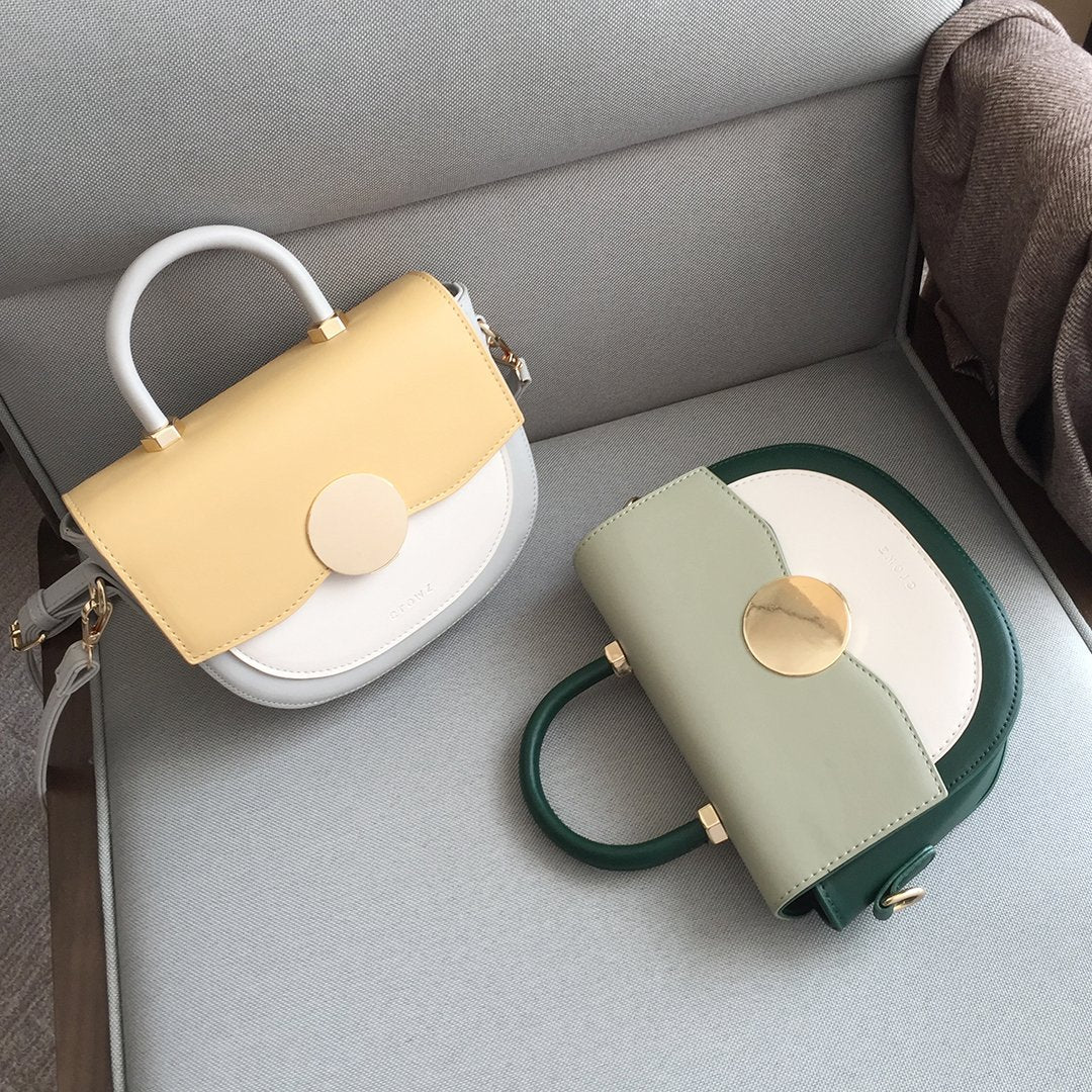Circular hardware flap colourblock PU leather crossbody bag