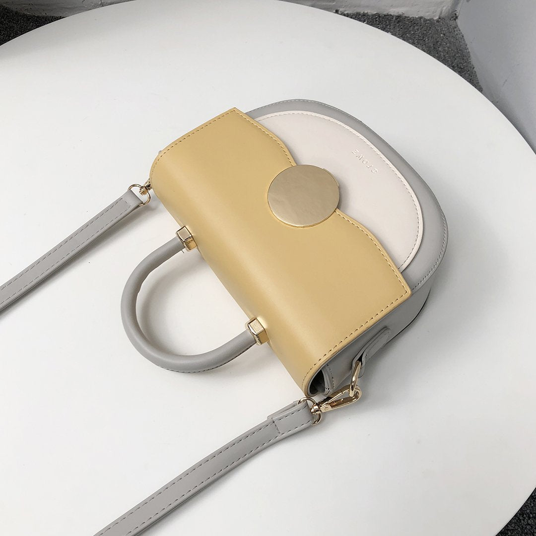 Circular hardware flap colourblock PU leather crossbody bag