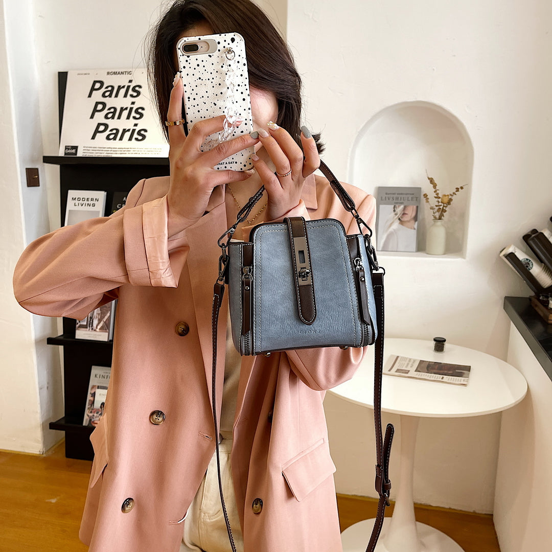 Metal turn-lock strap zip side PU leather crossbody bag