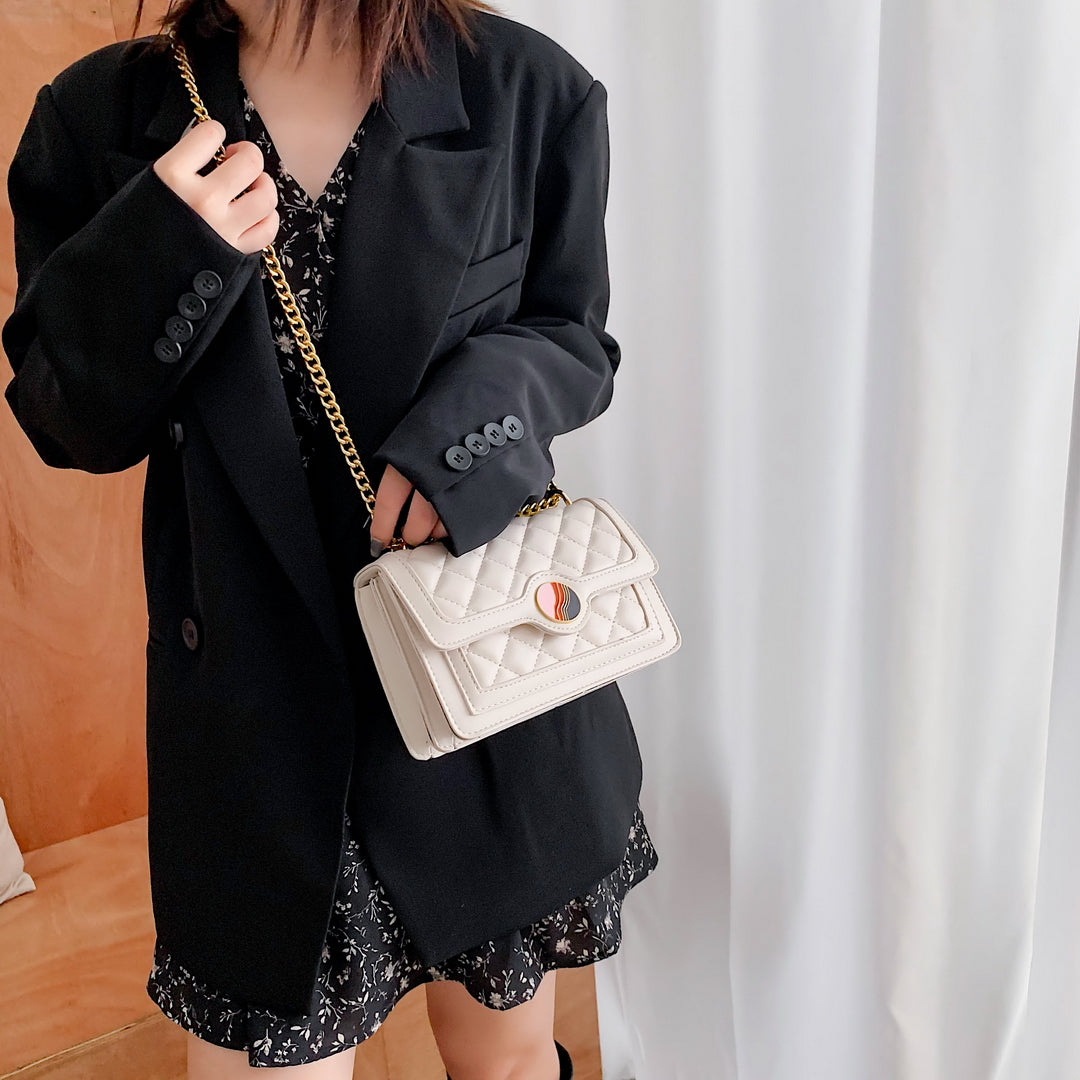 Colourblock disc embellished flap quilted PU leather crossbody bag