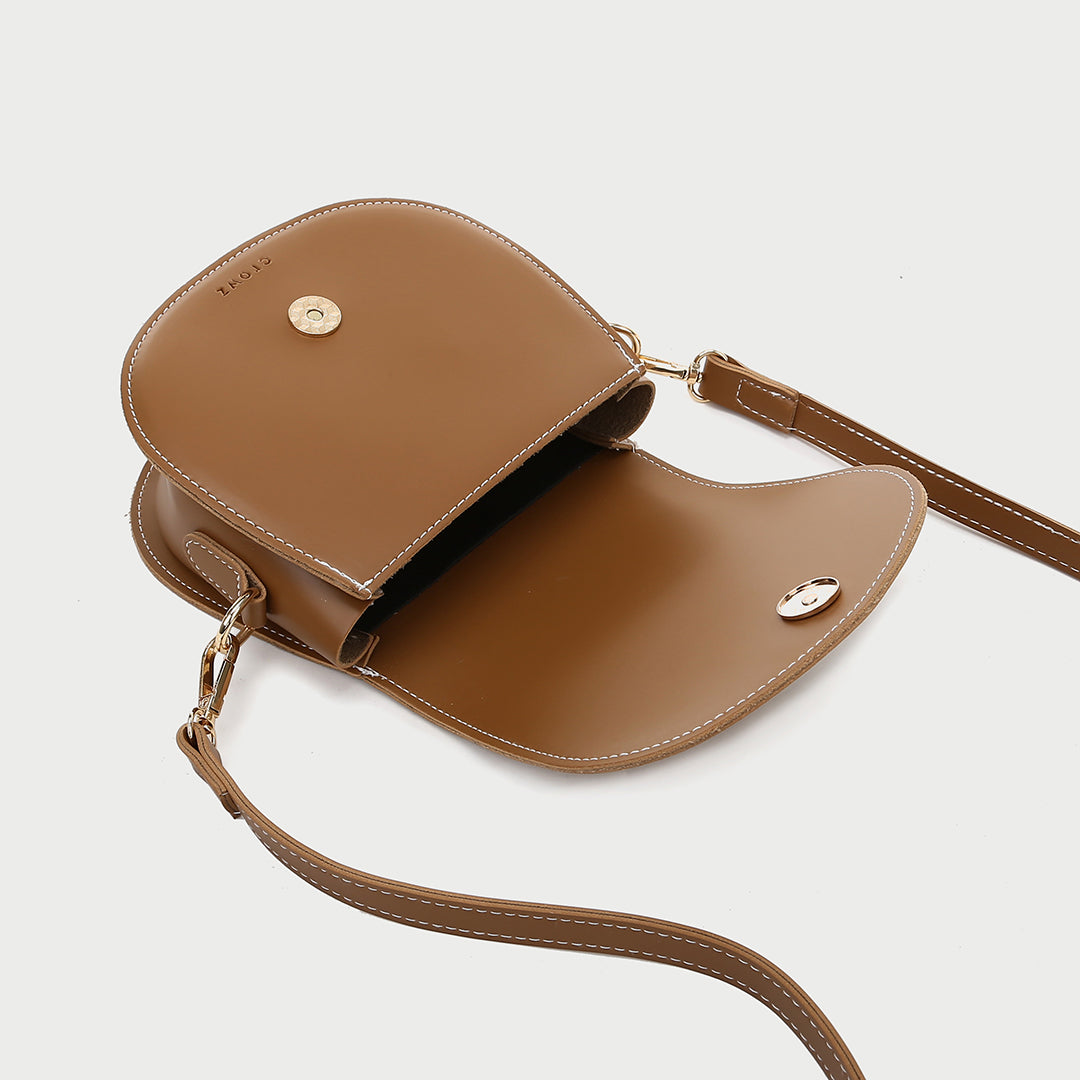 Contrast stud topstitched PU leather saddle bag