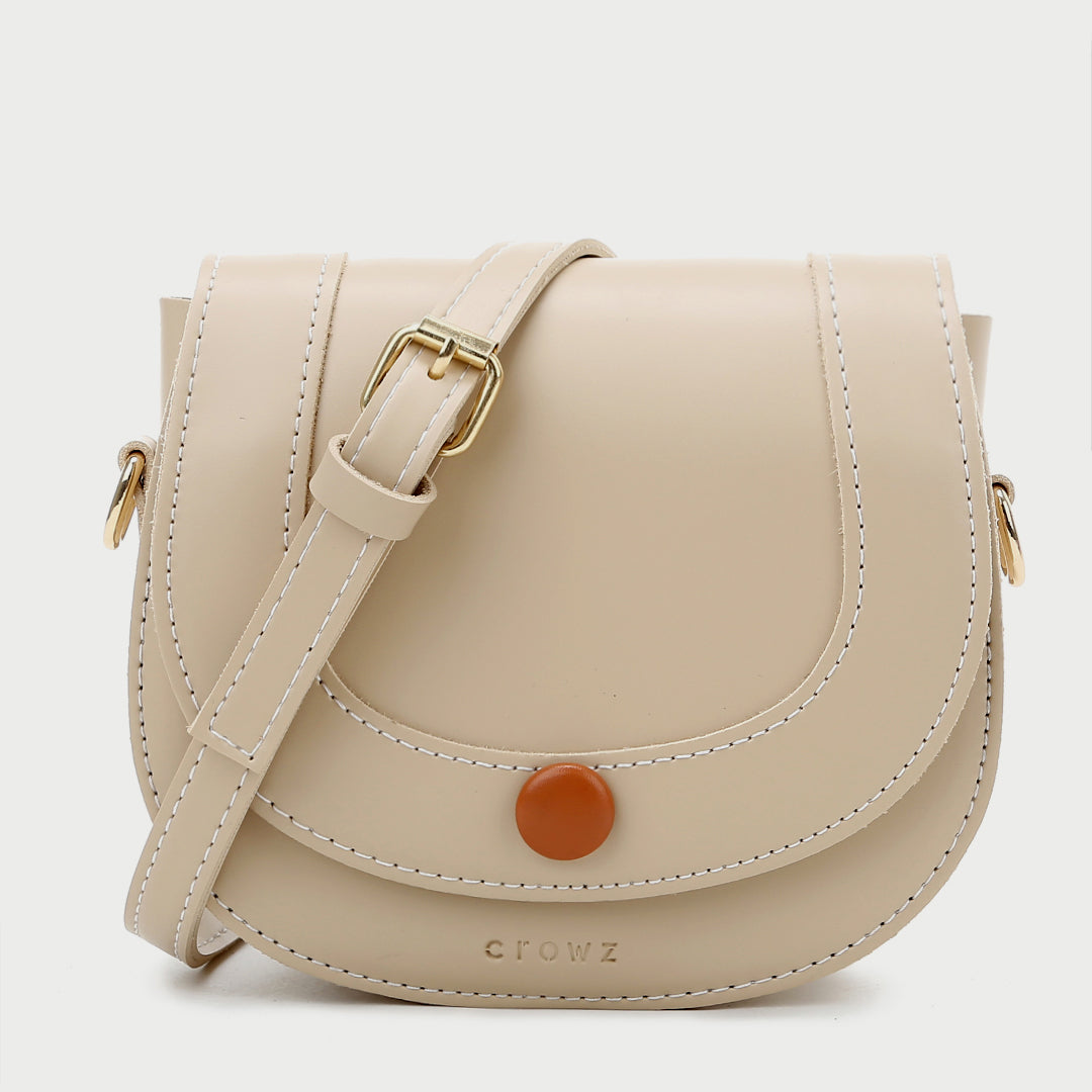 Contrast stud topstitched PU leather saddle bag