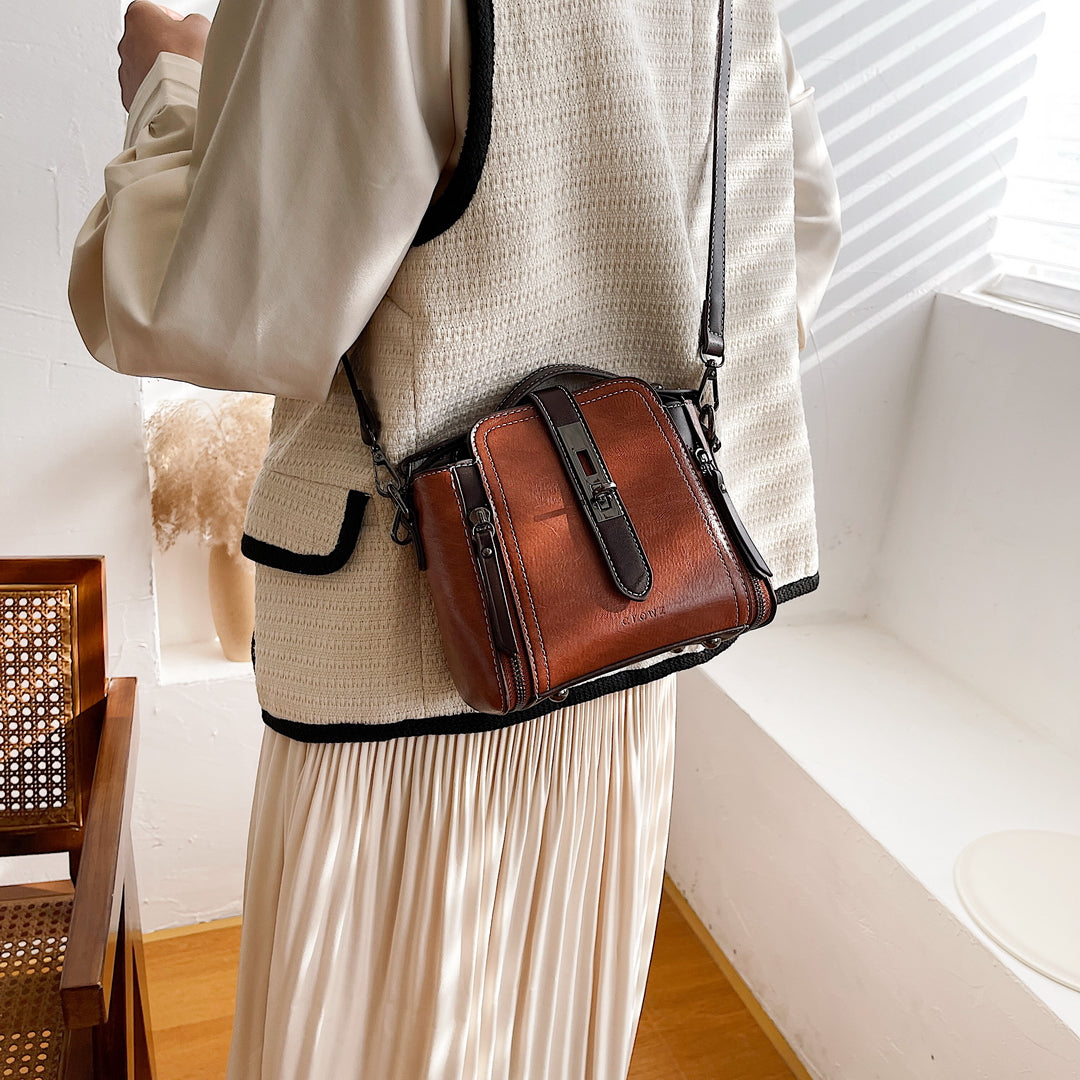 Metal turn-lock strap zip side PU leather crossbody bag