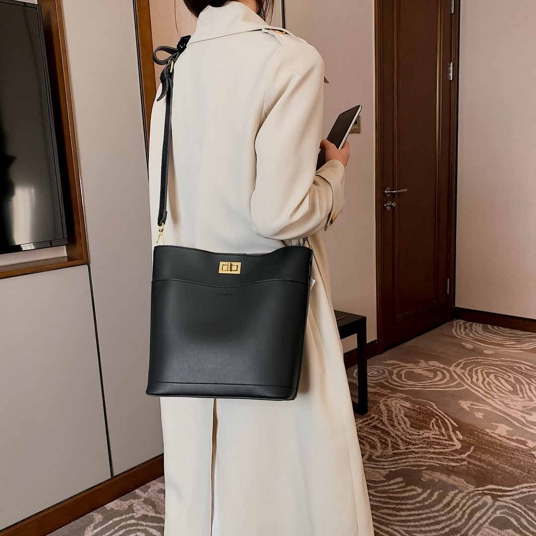 Minimalistic front pocket turn-lock PU leather bucket bag