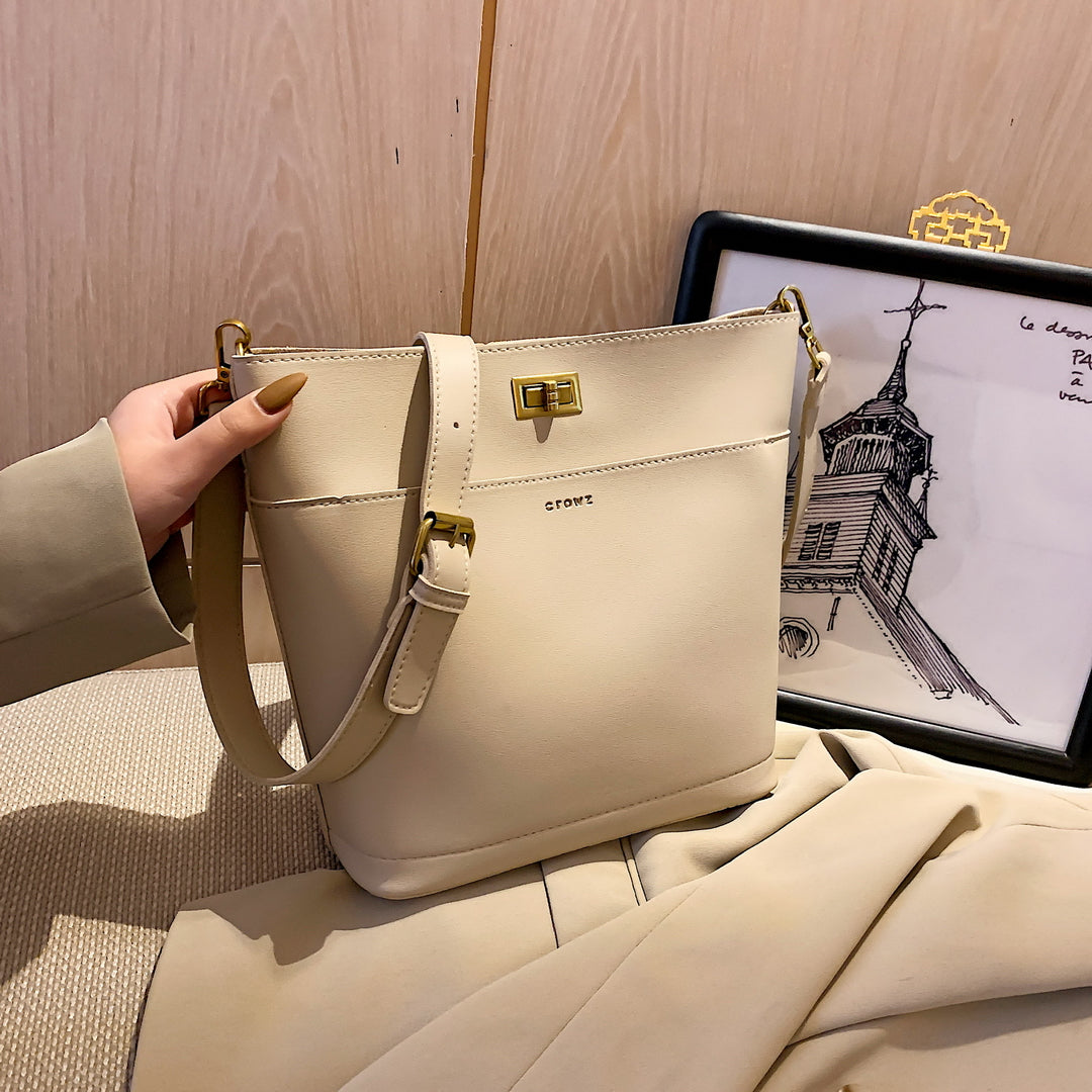 Minimalistic front pocket turn-lock PU leather bucket bag