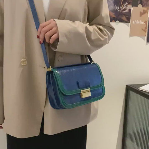 金屬搭扣翻蓋雙隔層仿皮革斜背包