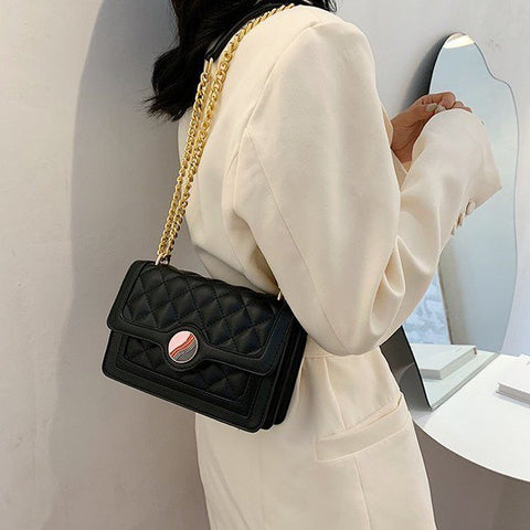 Colourblock disc embellished flap quilted PU leather crossbody bag