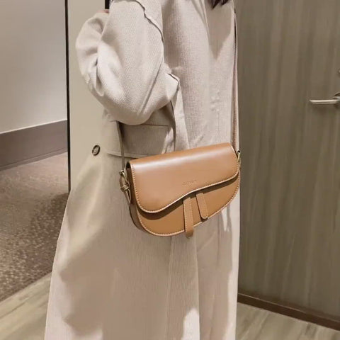 Retro strap detail flap sculptural PU leather saddle bag