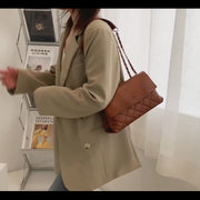 Flapover two-compartment quilted PU leather crossbody bag