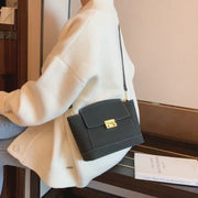 Modern metal-closure flap sculptural faux suede crossbody bag