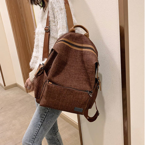 PU leather side buckled strap canvas backpack