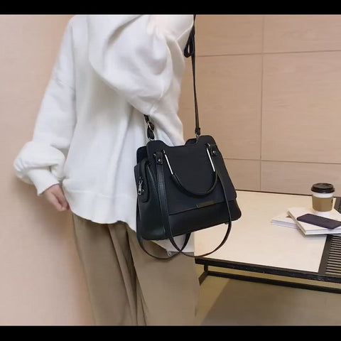 Front flap metal handle multi-strap zipped PU leather crossbody bag