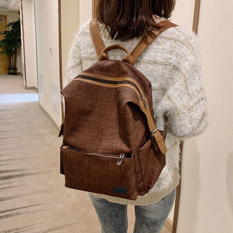 PU leather side buckled strap canvas backpack