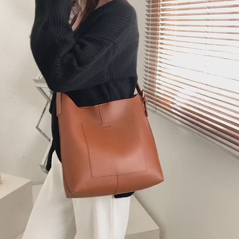 Minimalistic front pocket streamlined 2-in-1 PU leather bucket bag