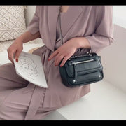 Zipped front flap studded PU leather crossbody bag
