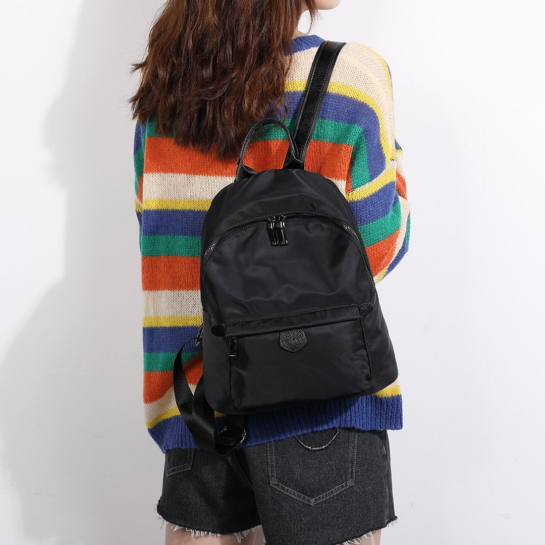 Logo stamped PU leather trim nylon backpack