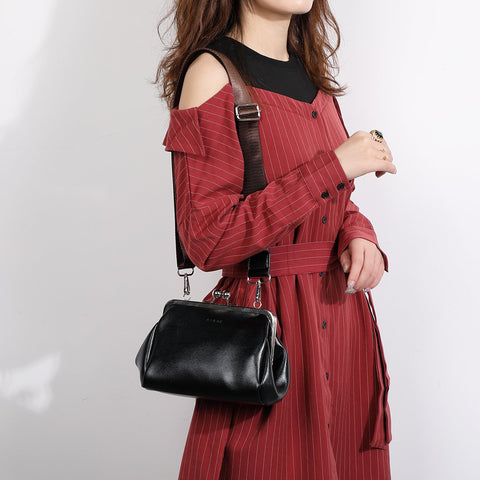 Kiss-lock PU leather crossbody bag