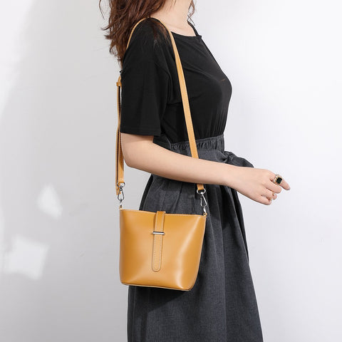 Strapped PU leather bucket bag