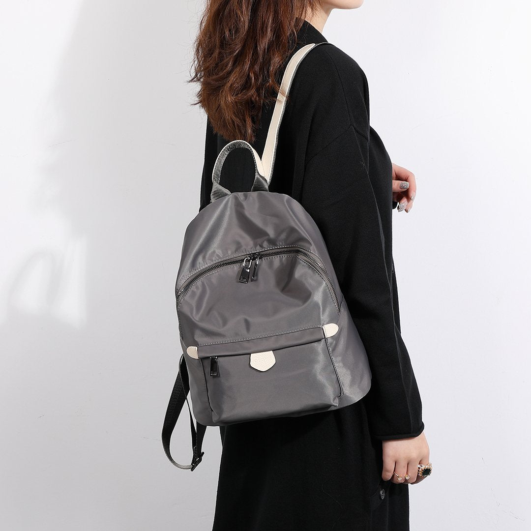 Logo stamped PU leather trim nylon backpack