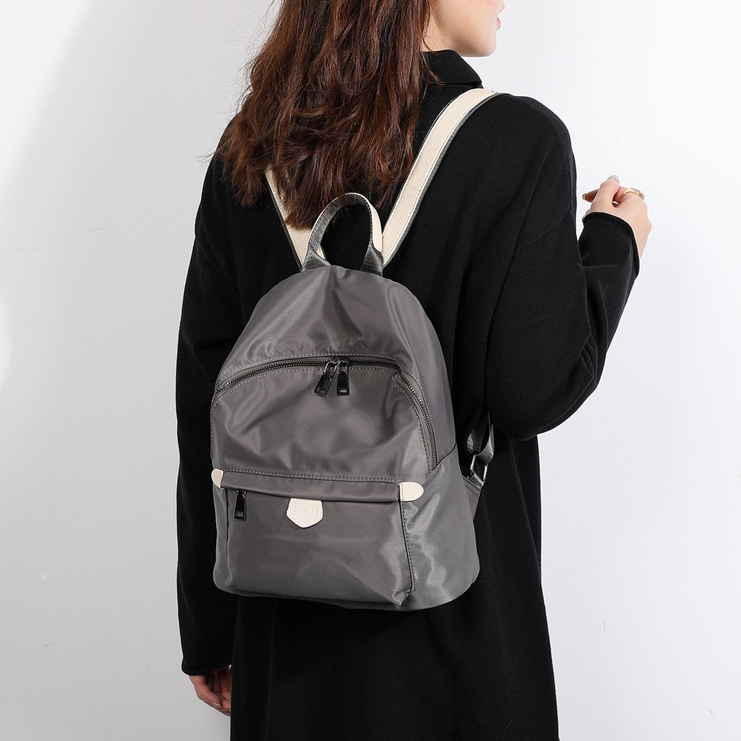 Logo stamped PU leather trim nylon backpack