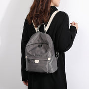 Logo stamped PU leather trim nylon backpack