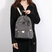 Logo stamped PU leather trim nylon backpack