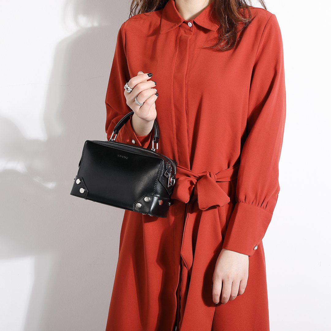 Studded corner marble-effect creased PU leather bag