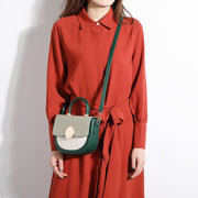 Circular hardware flap colourblock PU leather crossbody bag