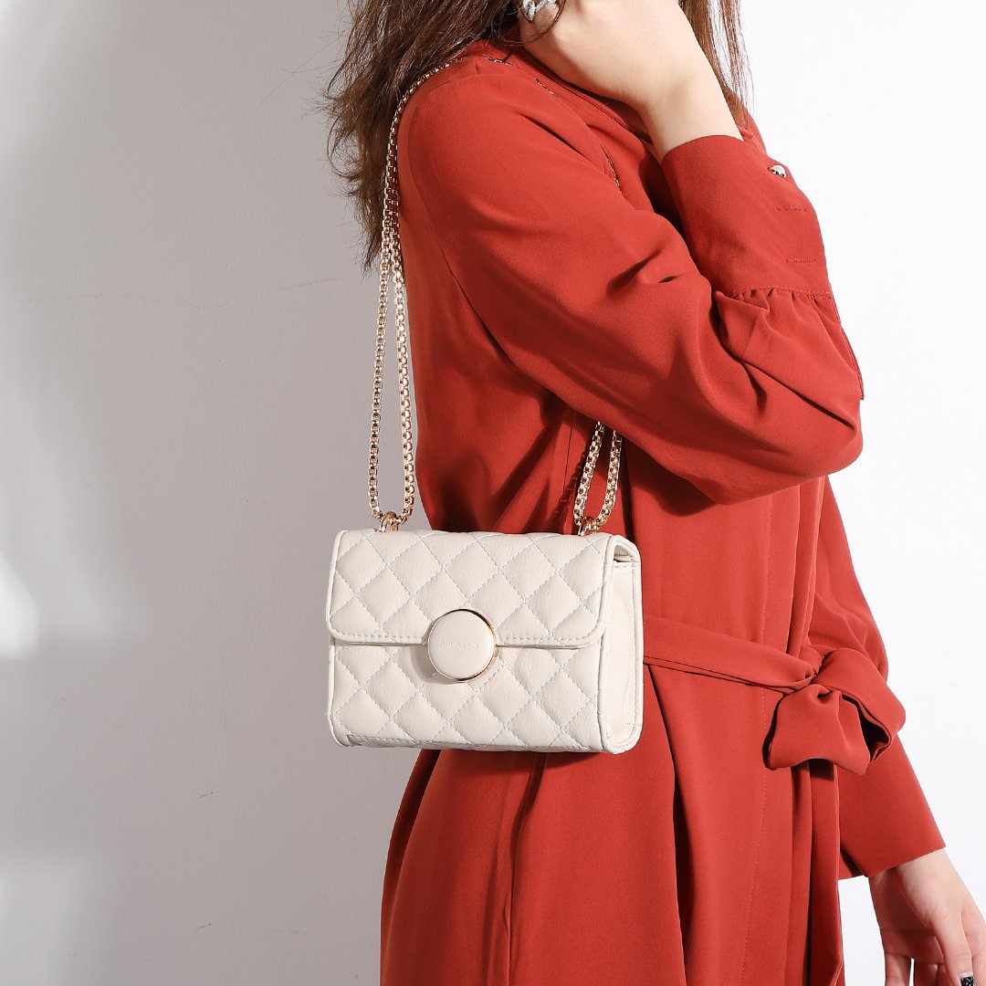 Dome magnetic snap quilted PU leather crossbody bag