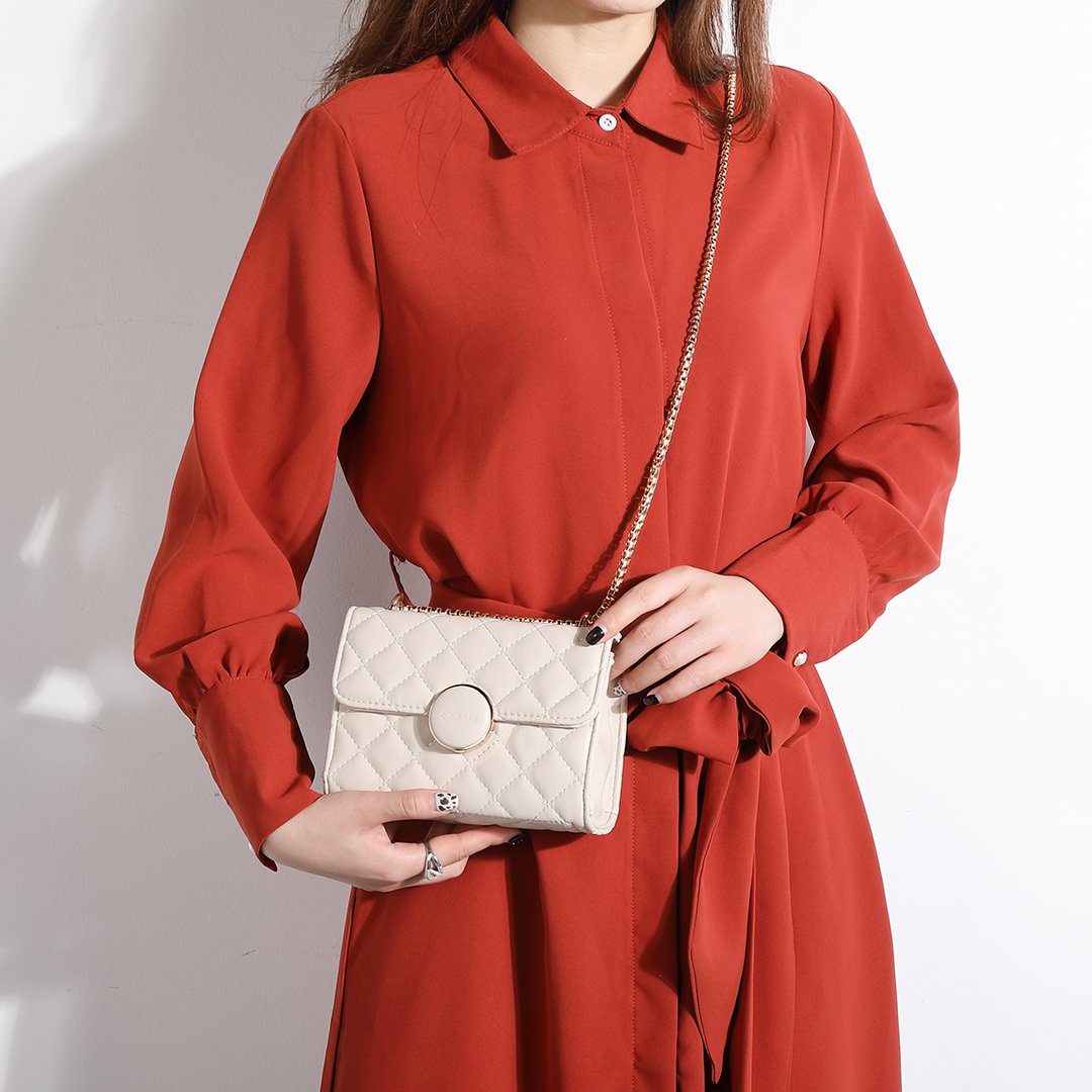 Dome magnetic snap quilted PU leather crossbody bag