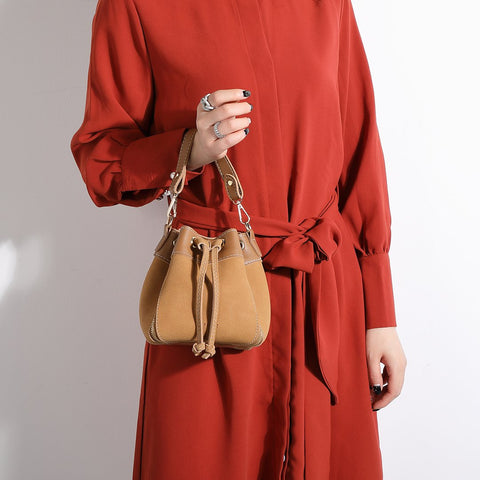 Zip detail drawstring dual compartment PU leather bucket bag