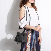 Zip detail drawstring dual compartment PU leather bucket bag