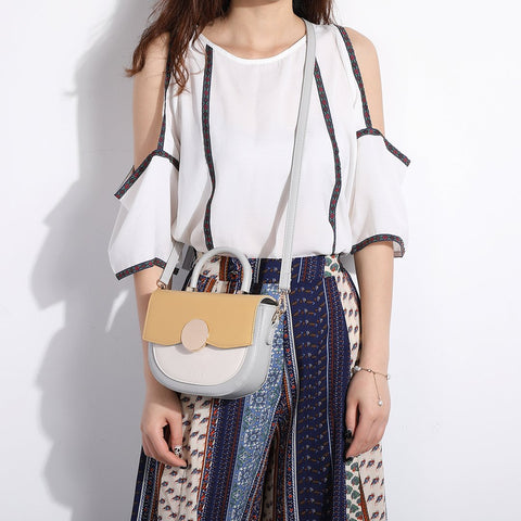Circular hardware flap colourblock PU leather crossbody bag