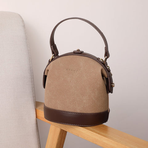 Retro snap-fastening cylindrical PU leather bucket bag