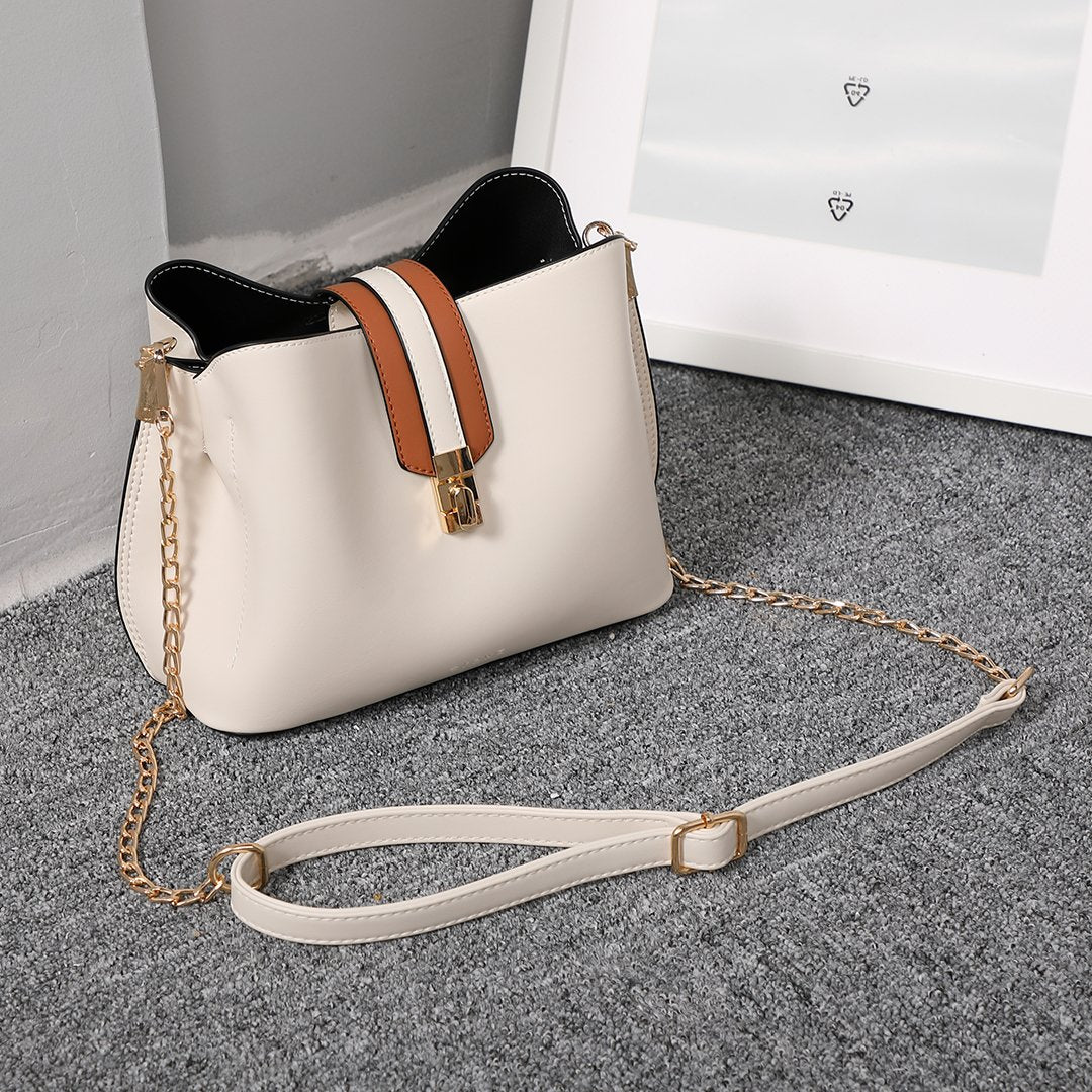 Striped strap PU leather bucket bag