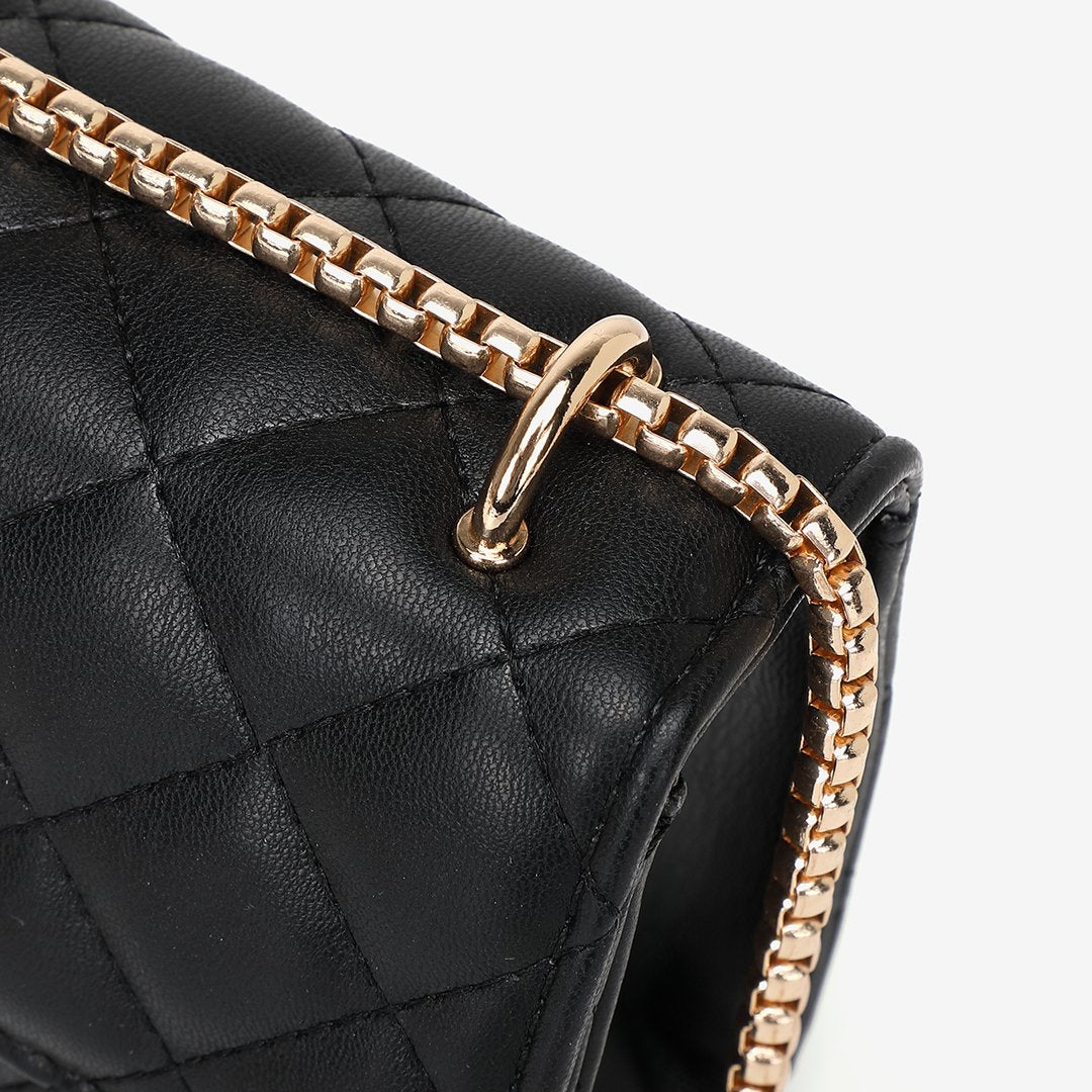 Dome magnetic snap quilted PU leather crossbody bag
