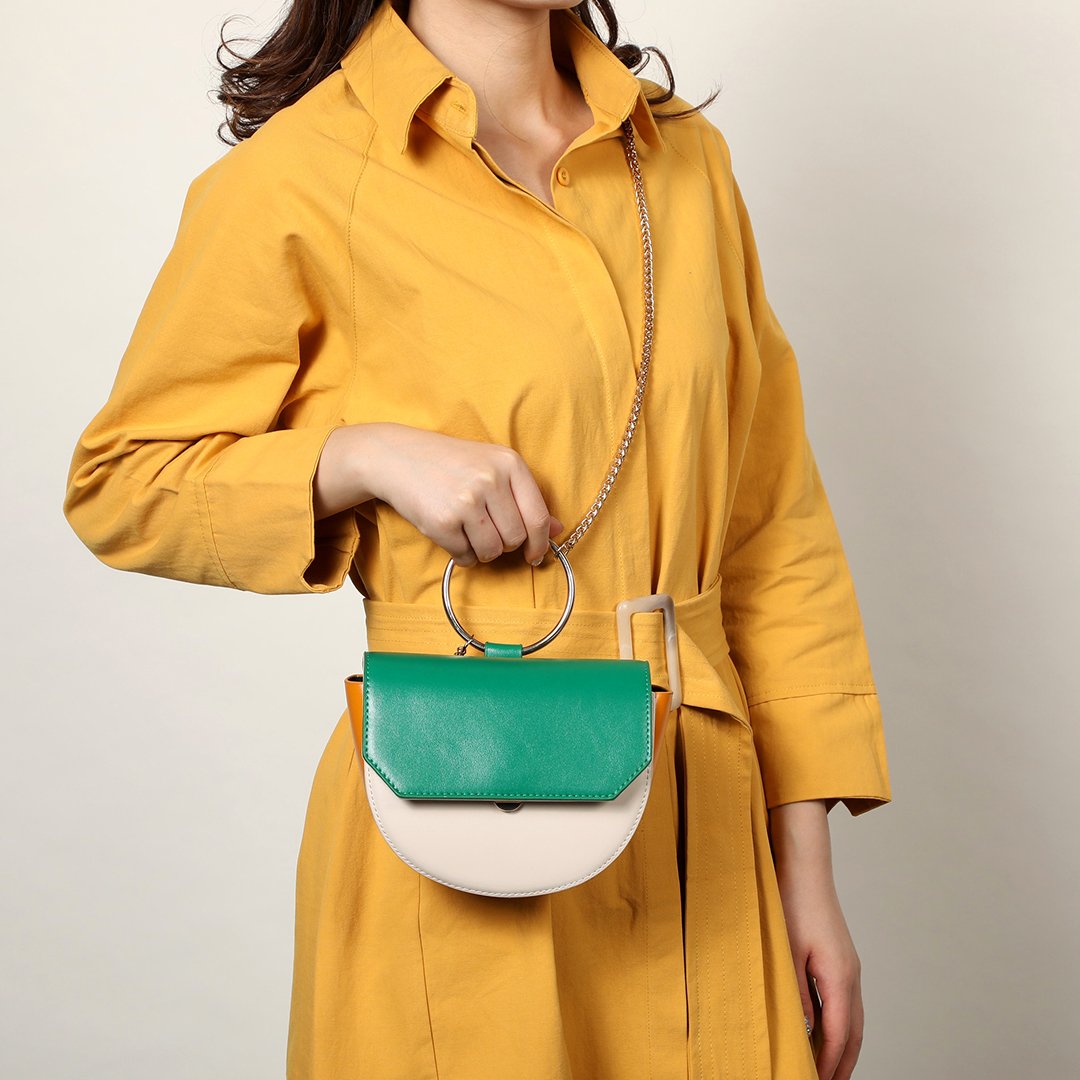Ring handle colourblock half-moon bag