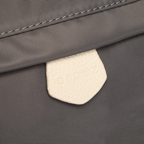 Logo stamped PU leather trim nylon backpack