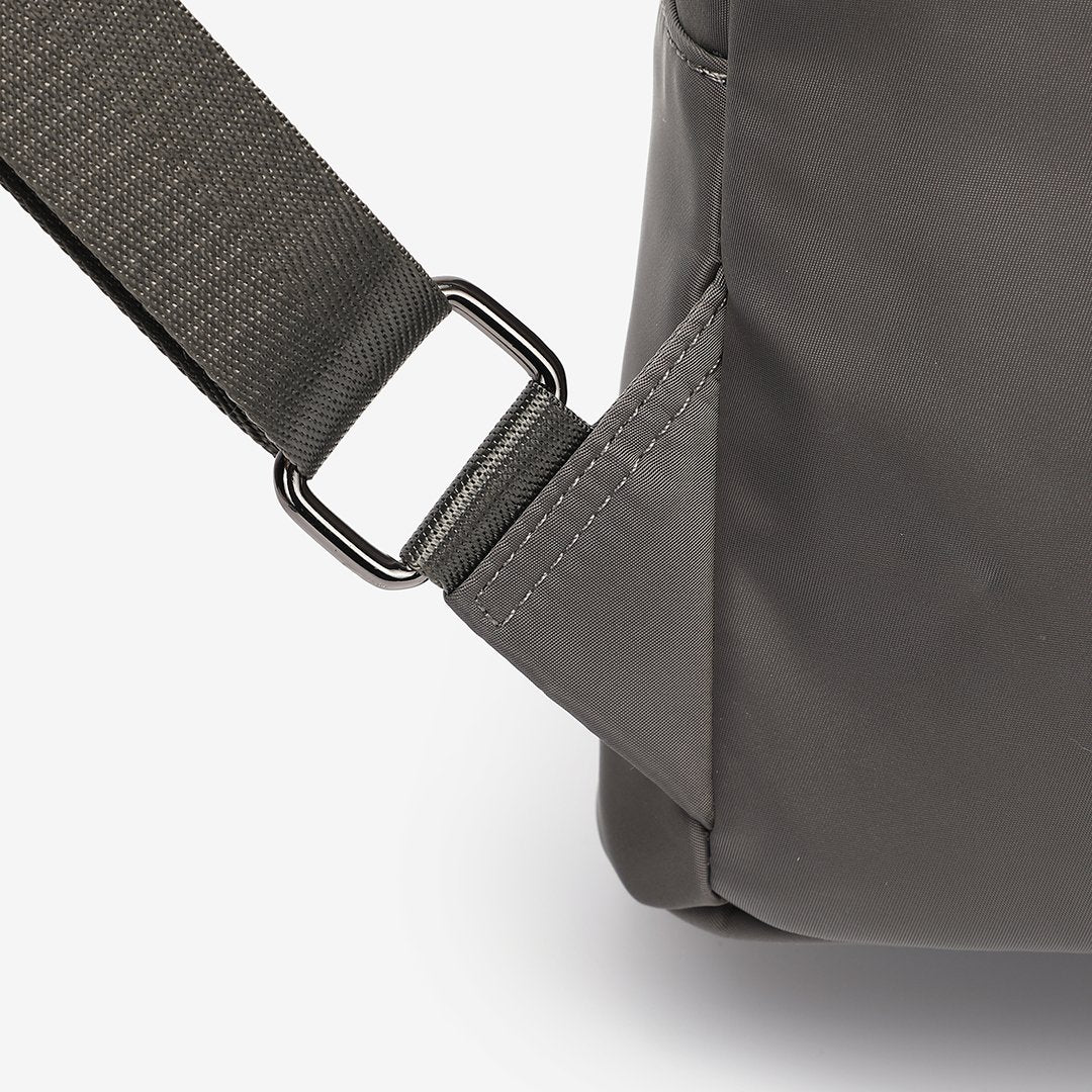 Logo stamped PU leather trim nylon backpack