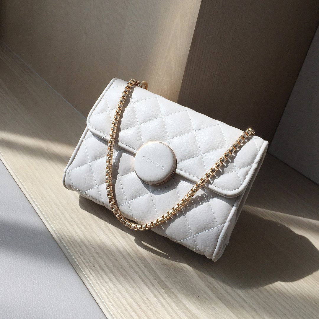 Dome magnetic snap quilted PU leather crossbody bag