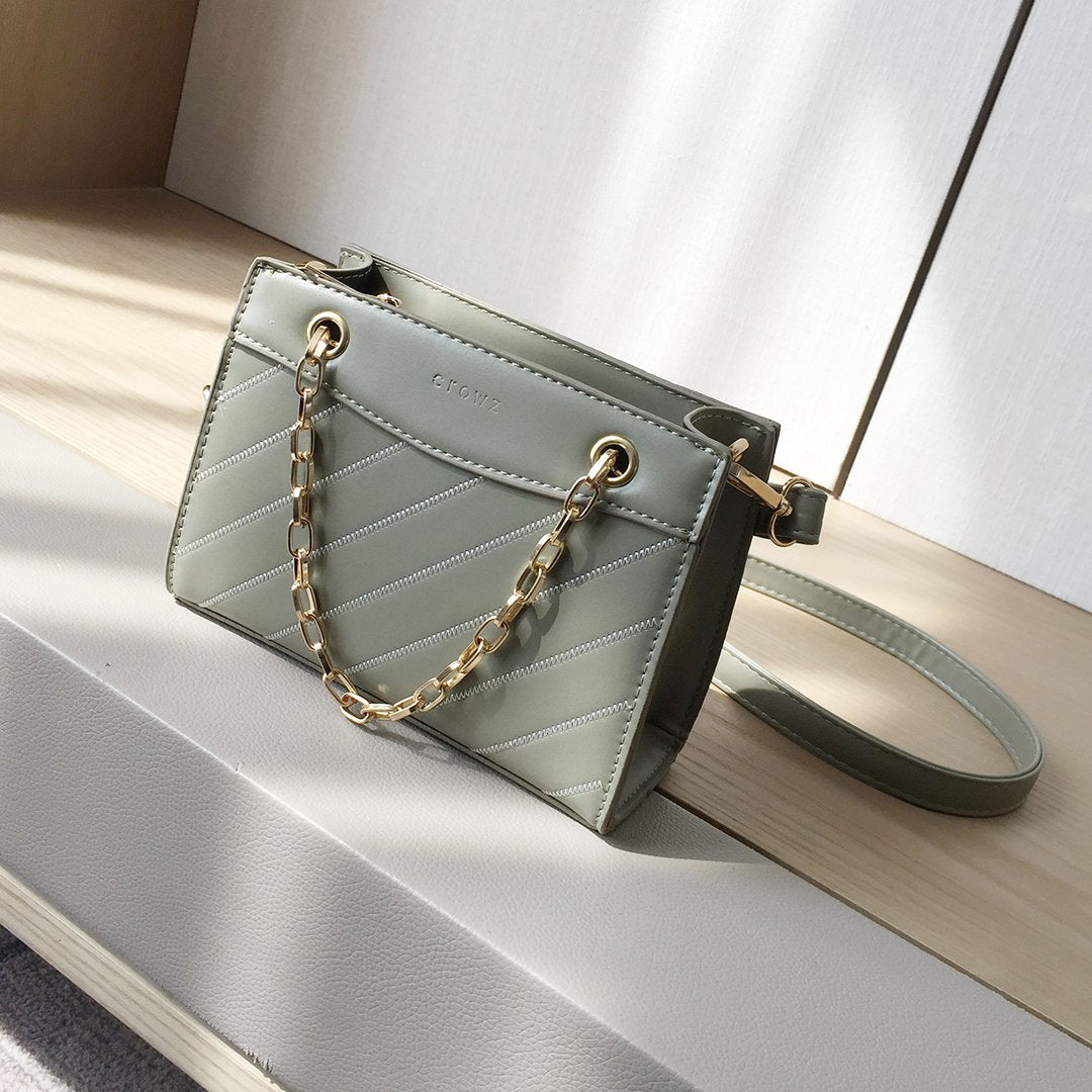 Striped panel chain handle PU leather crossbody bag